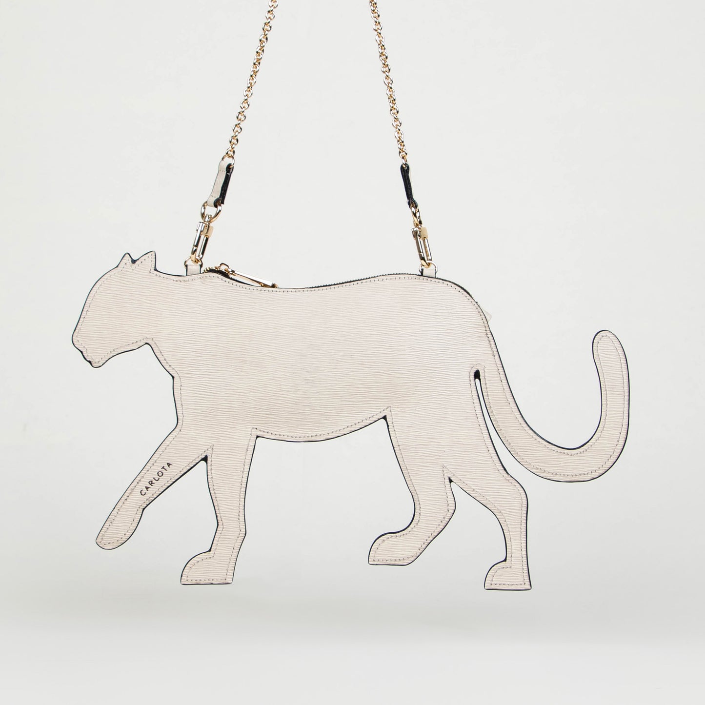 CROSSBODY JAGUAR HUESO TEXTURA