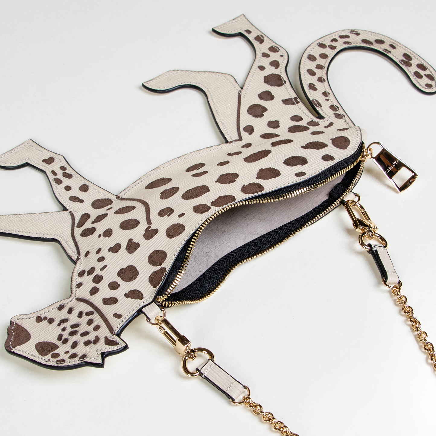 CROSSBODY JAGUAR HUESO TEXTURA